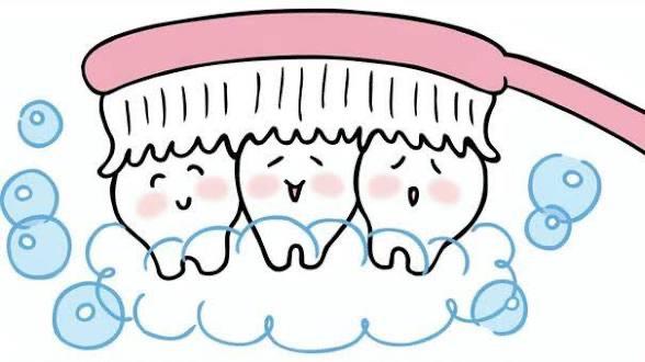 歯磨き粉を使用して歯磨きをする様子
