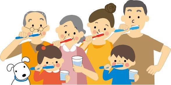 歯磨きで虫歯予防をする家族